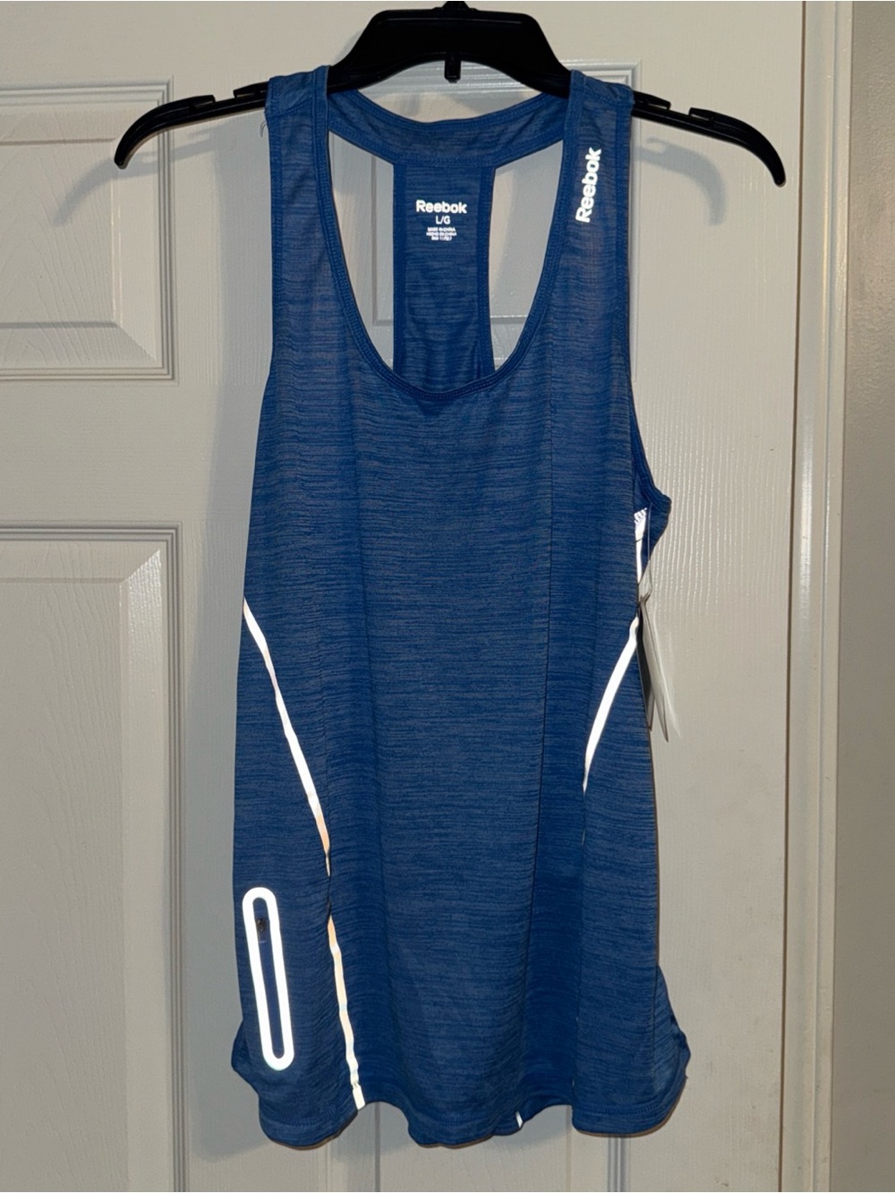 Reebok Women’s Blue Racerback Training Tank with White Reflective Trim